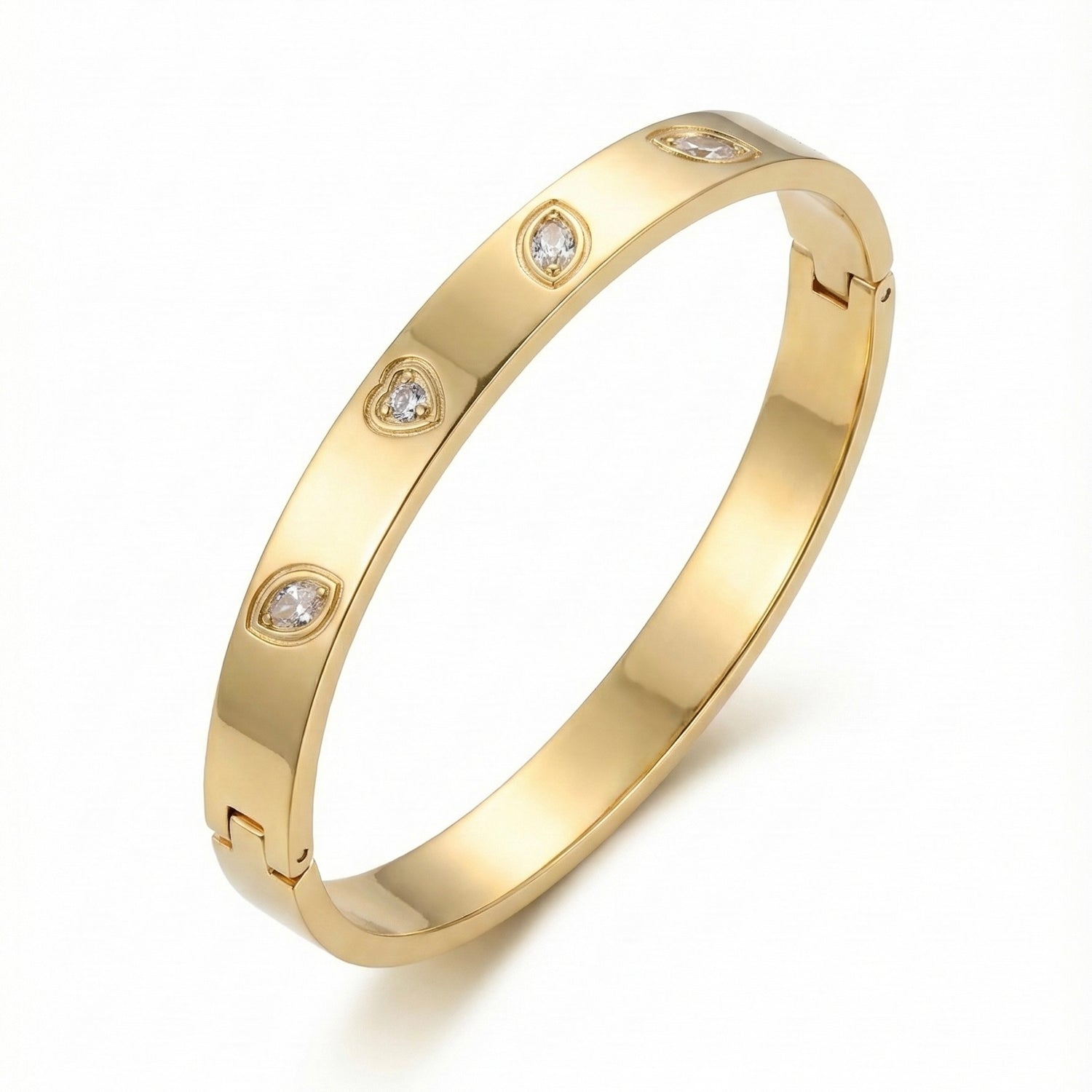 Gold anti-tarnish bangle with crystals on white display.