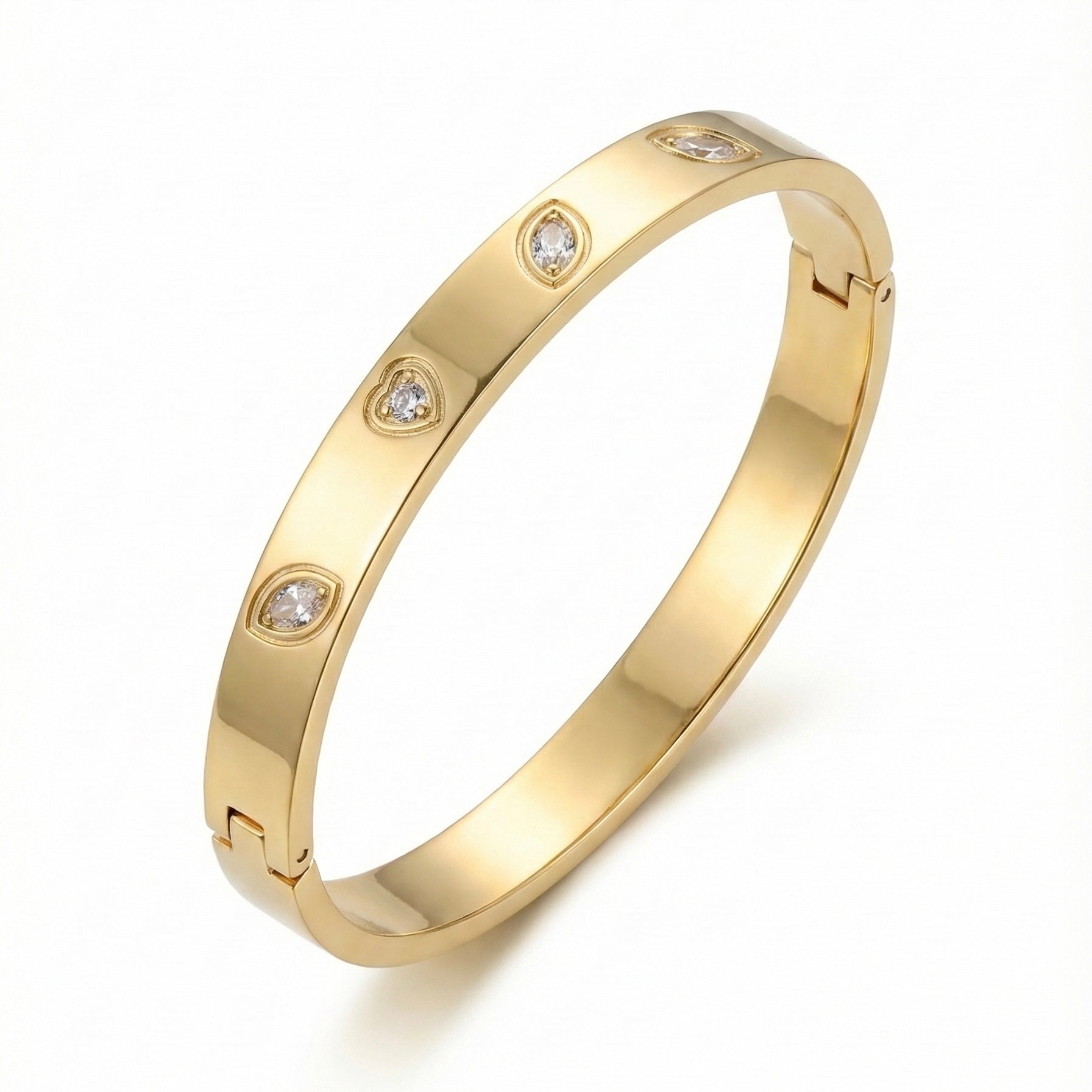 Gold anti-tarnish bangle with crystals on white display.