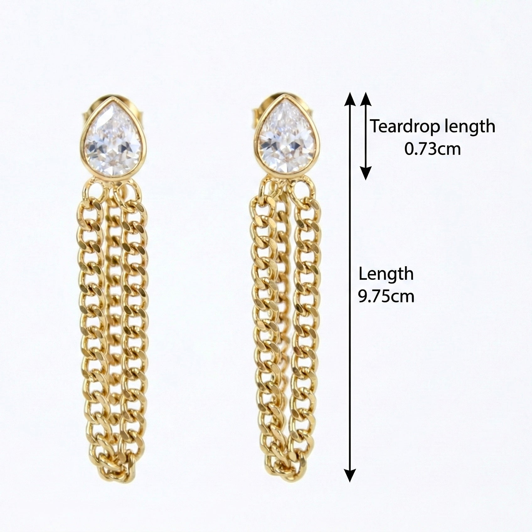 Gold chain earrings with teardrop-shaped crystals, showing measurements on a white background.