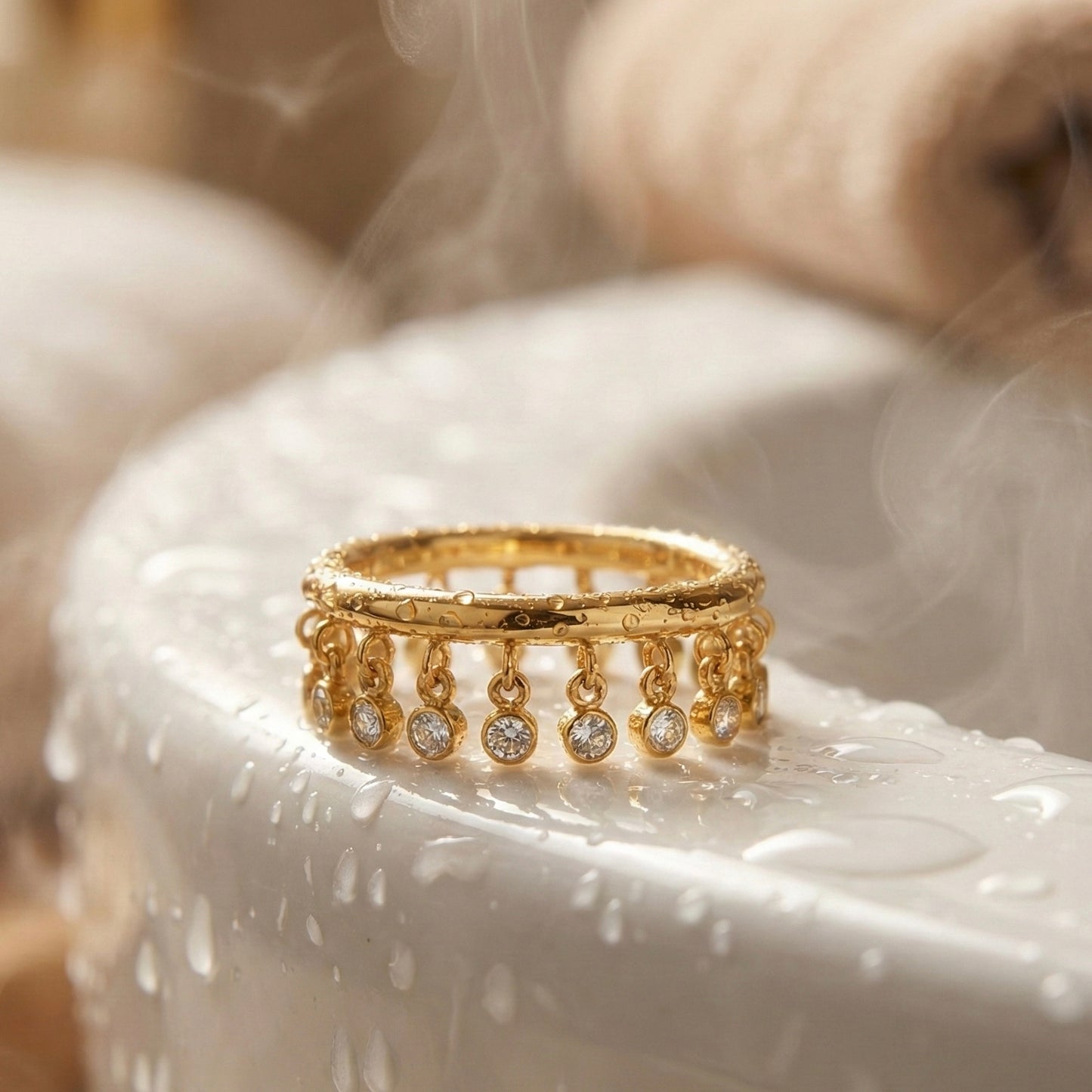 Close up of gold fringe ring details.